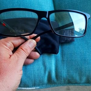 Gucci glasses. Number 005. They are regular lenses. Very nice condition.